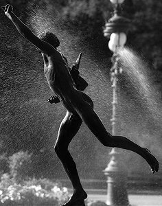 Falgui�re's Cockfight - weathered copy in a park, backlit against fountain, by Pierre Beteille on Flickr