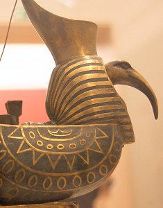 The Singer by Edward Onslow Ford - base of harp, right