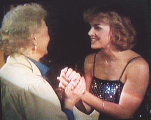 Brenda is thrilled at the idea of modeling for Conrad's